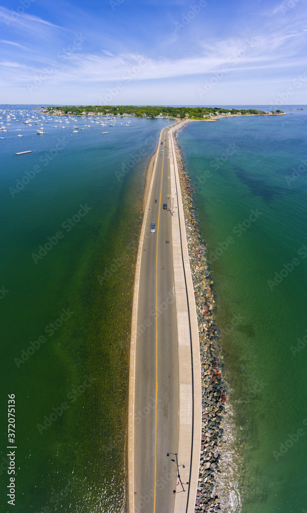 Aerial view of Marblehead causeway on Ocean Avenue and Marblehead Harbor in town of Marblehead, Massachusetts MA, USA. 