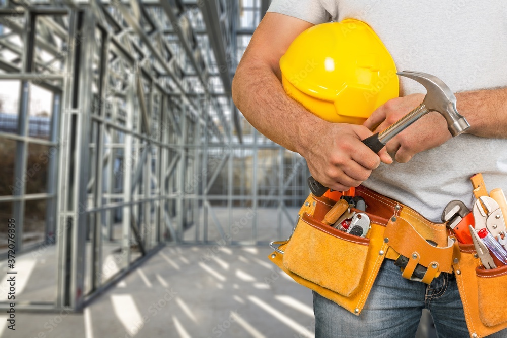 Man worker or professional builder with tools Man worker or professional builder with tools