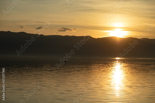 lake and mountain at the sunset