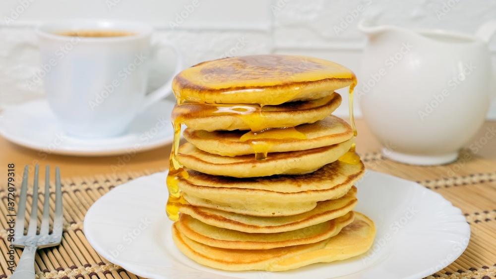 Sweet food. Pancakes with honey and berry fruit Sweet food. Pancakes with honey and berry fruit