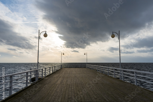 pier by the sea in winter © Tomasz