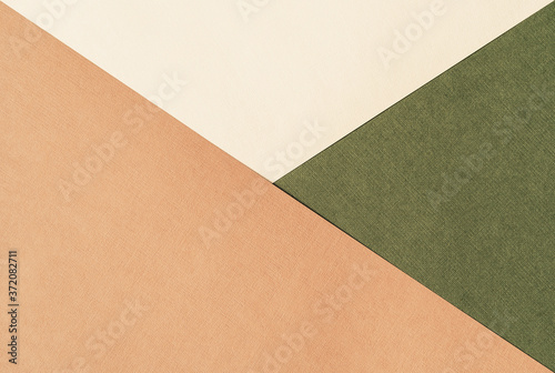 Paper for pastel overlap in beige, green and terracotta colors for background, banner, presentation template. Creative modern trendy background design in natural colors. Trendy paper for pastel photo