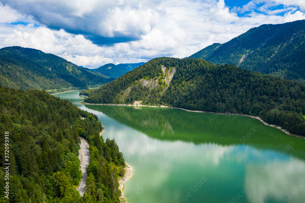 Aerial view of Sylvenstein Lake on cloudy summer day