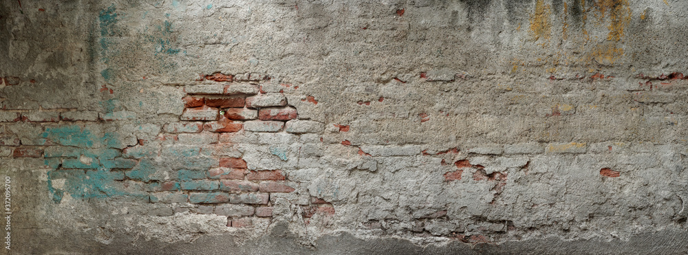 Old brick wall banner. Painted Distressed Wall Surface. Grungy texture.  Grunge wall background. Building facade with damaged plaster. Stock Photo |  Adobe Stock
