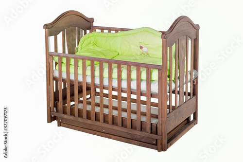 Wooden crib isolated on a white background © orkooo