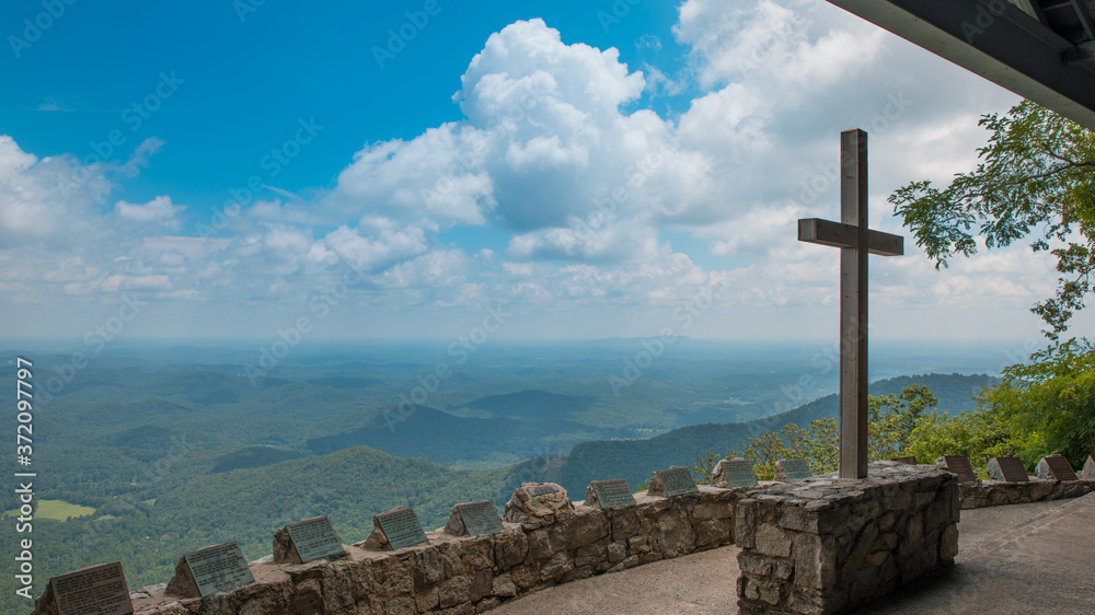 View on Mountains and Cross. Baptist, catholic or christian Church. Jesus or God Religious symbol.