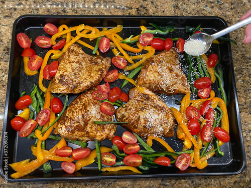 roasted chicken, tomatoes, beans and peppers with a sprinkled bit of parmesian photo