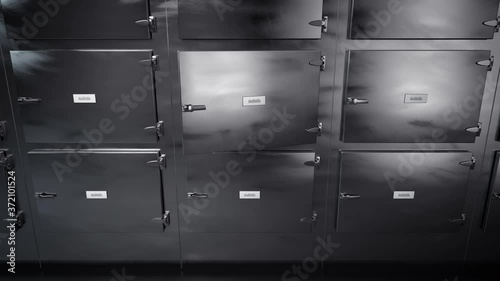 Dead body slide into mortuary refrigeraor for later autopsy, corpse on metal tray covered with white cloth, sliding into morgue freezer waiting for dissection. Front closeup view.
