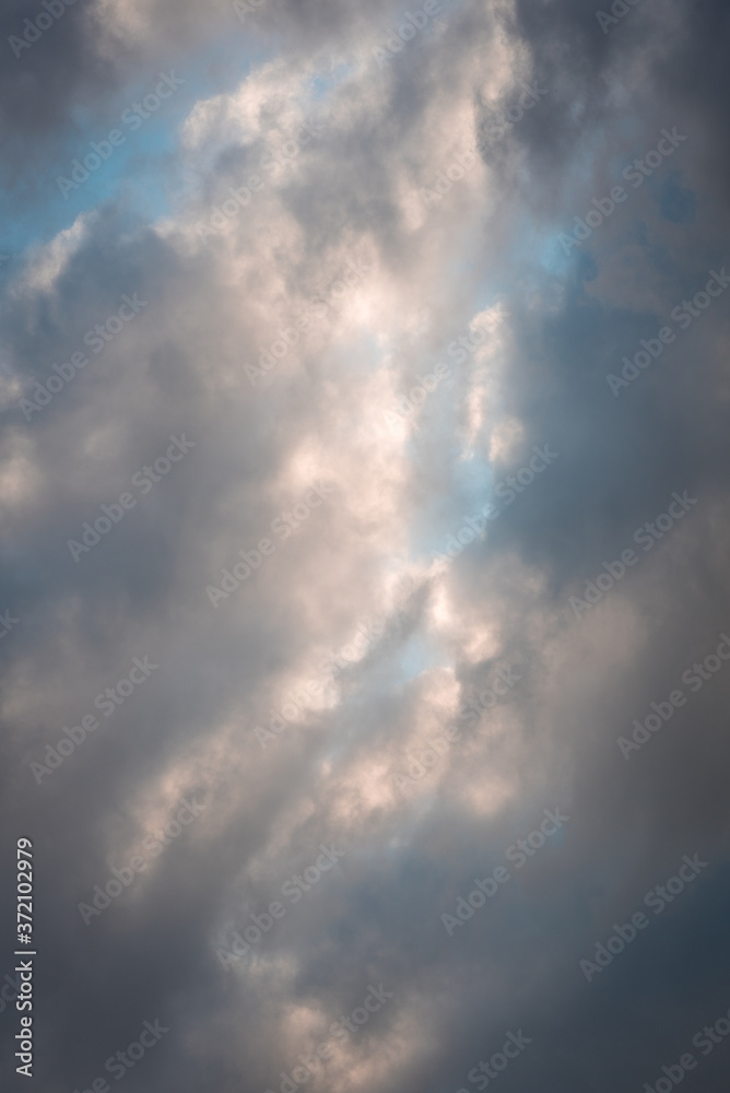 clouds and sunrays in summer 
