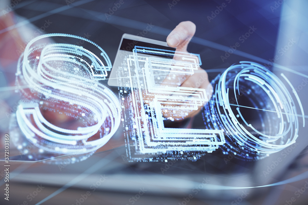 Double exposure of man hands holding a credit card and SEO drawing. Search engine optimization in Internet E-commerce concept. Double exposure of man hands holding a credit card and SEO drawing. Search engine optimization in Internet E-commerce concept.