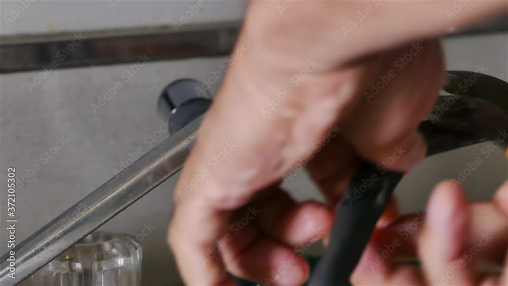 Plumber is fixing old drinking water faucet Plumber is fixing old drinking water faucet