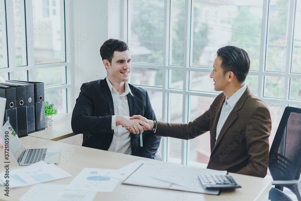 Business people can make business deals. The congratulatory handshake. Business people can make business deals. The congratulatory handshake.