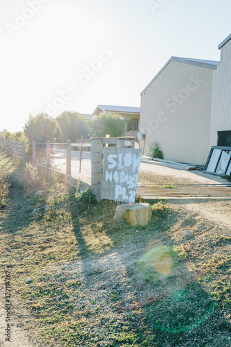 A homemade sign saying slowdown in Boonah, Scenic Rim Region, Queensland (QLD) photo