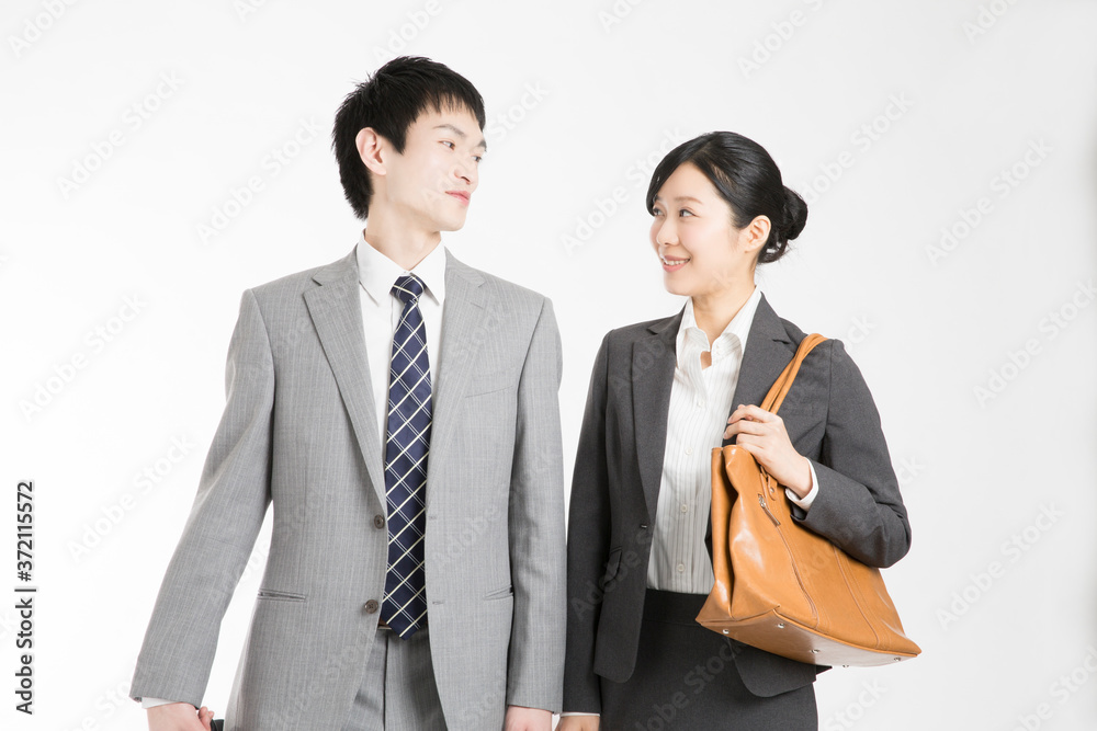 会話するビジネスマンとＯＬ