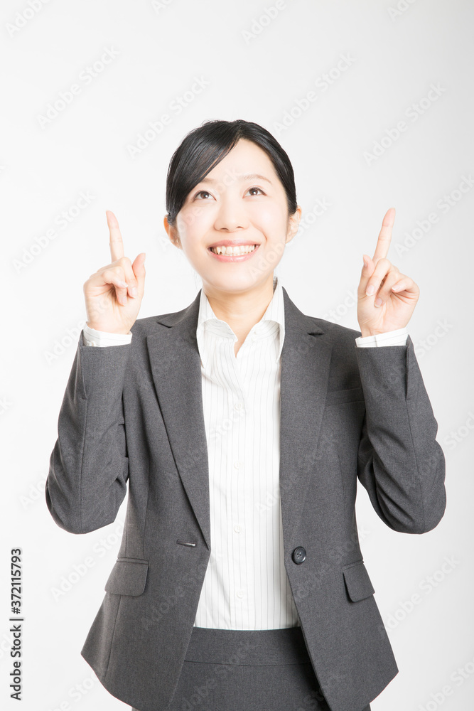 指差しをするOL