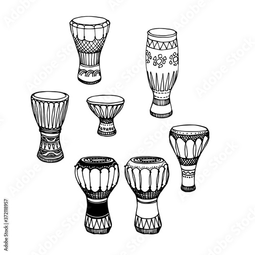 a set of percussion musical instruments, African drums, djembe, conga, darbuka, vector illustration with black ink contour lines isolated on a white background in a doodle & hand drawn style