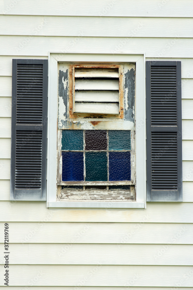 Fototapeta premium Old window with colored glass