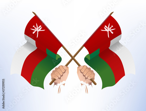 Flying flags crossed from the country of Oman