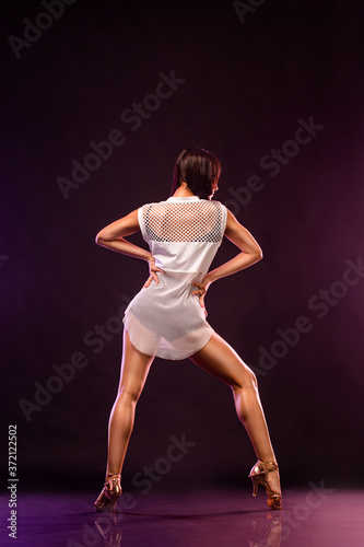 Girl athlete dancing sports ballroom dancing.