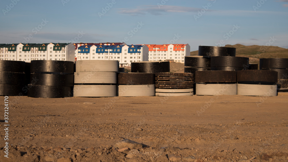 Concrete sewer wells, rings and manholes in ground. concrete manhole Concrete sewer wells, rings and manholes in ground. concrete manhole