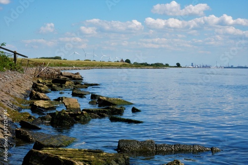 Beautiful view over the Haringvliet near Numansdorp with a view of the industrial area Moerdijk. photo