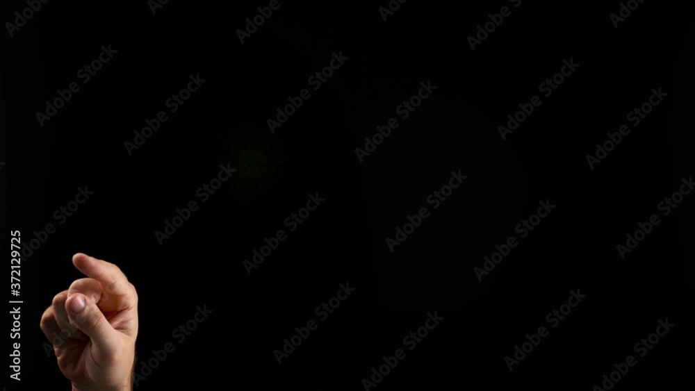 Hand showing letter Z on dark background. Sign language alphabet