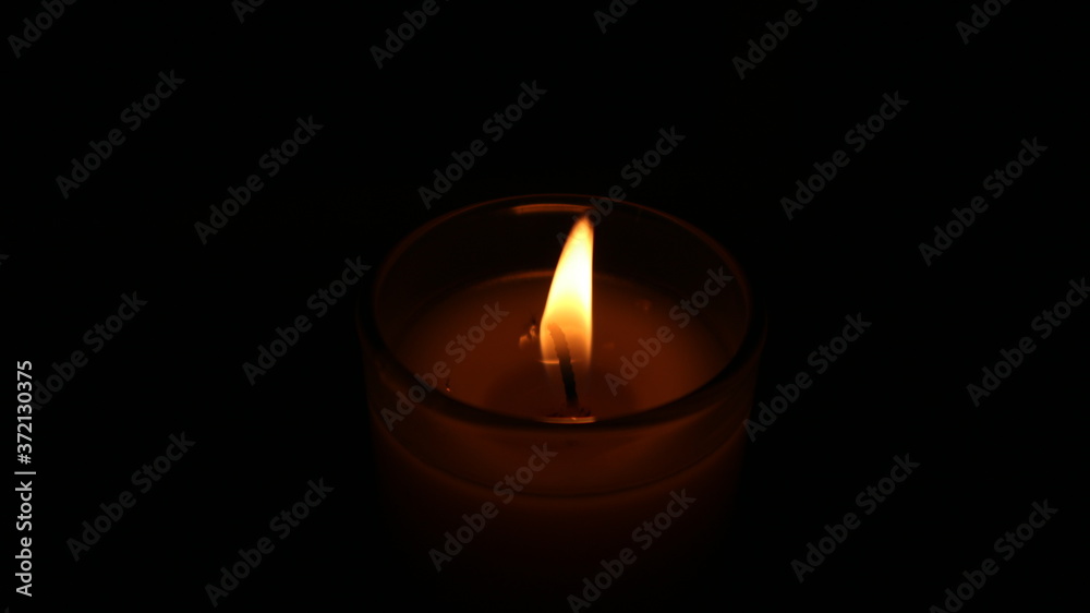 burning candle in the dark burning candle in the dark