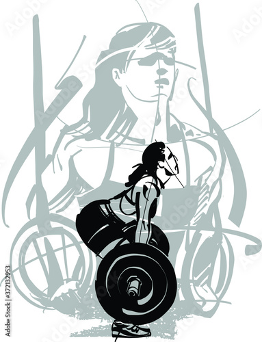 The fit woman doing pull-ups on the rings and weightlifter woman with a barbell 