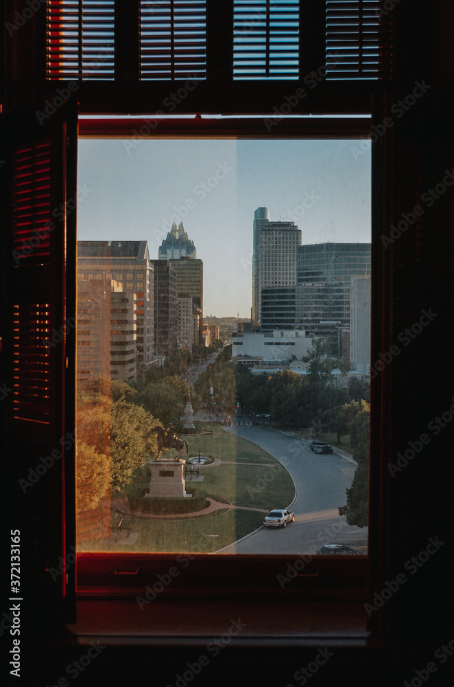 A unique view of a city through a window A unique view of a city through a window