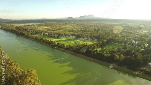 Aérea sobre la pista de canotaje Virgilo Uribe con vista panorámica a los canales de Xochimilco durante el amanecer photo