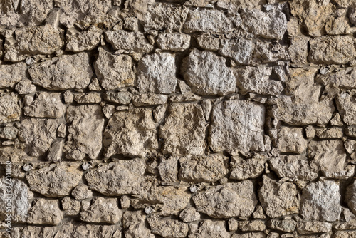 Background of traditional old brown brick wall texture, seamless tiling texture