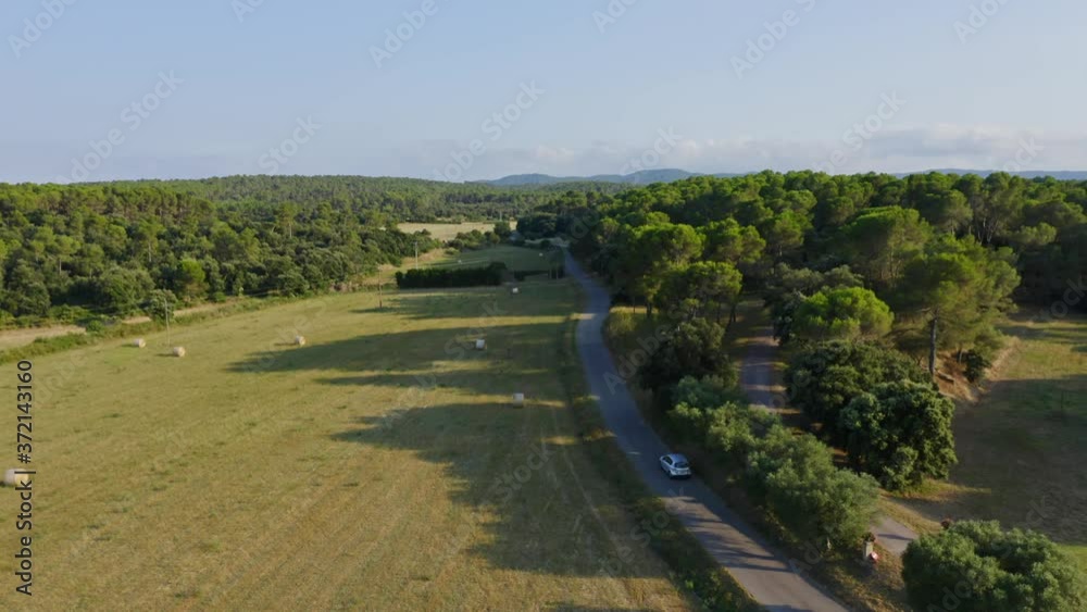 Tracking shot following a car as it journeys through Palau Sator Catalonia Spain. Tracking shot following a car as it journeys through Palau Sator Catalonia Spain.