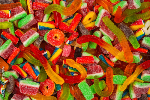 Assorted gummy candies. Top view. Jelly sweets background.