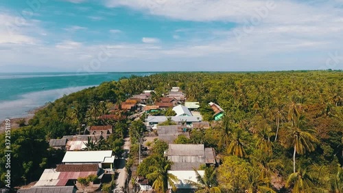 Fly past over the villages of Medang island Indonesia. Travel concept. photo