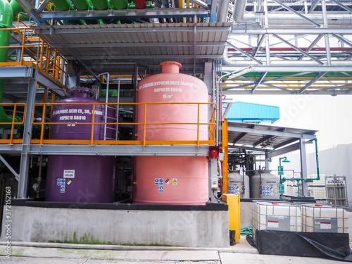 Tanks of chemical dosing in Combined-Cycle Co-Generation Power Plant. photo