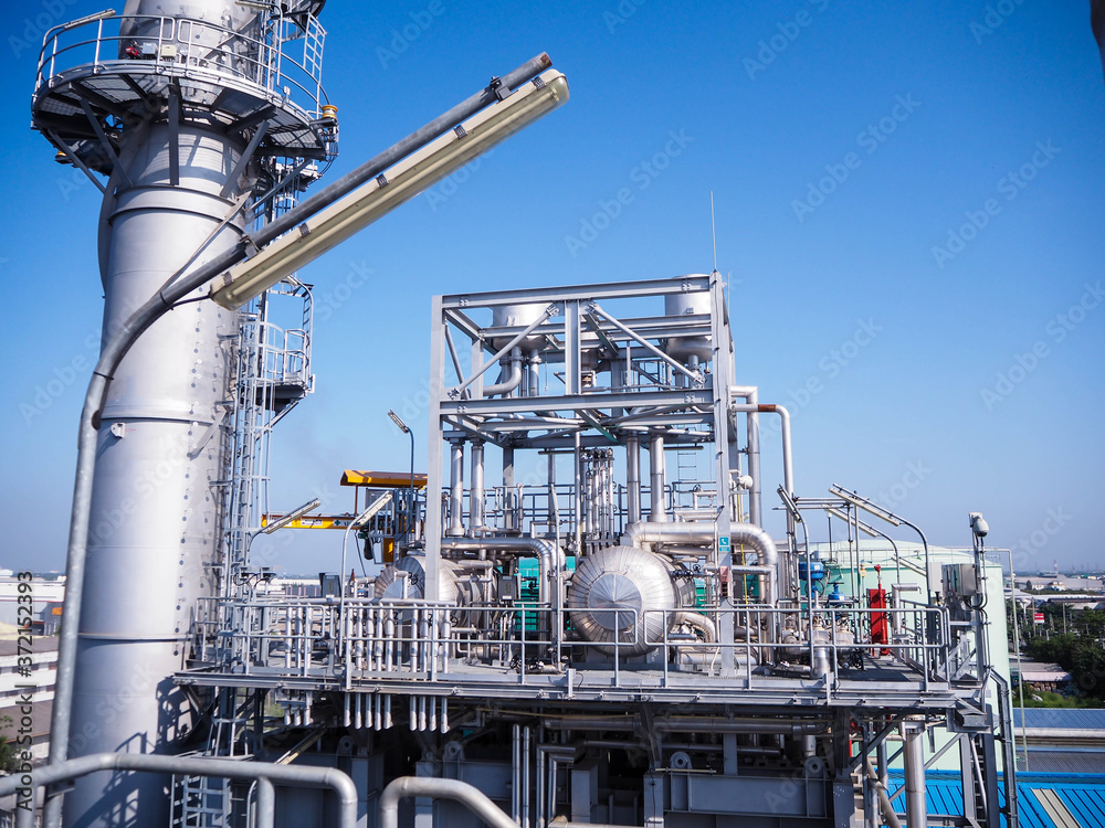 Heat recovery steam generator and sky in Combined-Cycle Co-Generation Power Plant which it so beautiful and popular to background power plant concept.