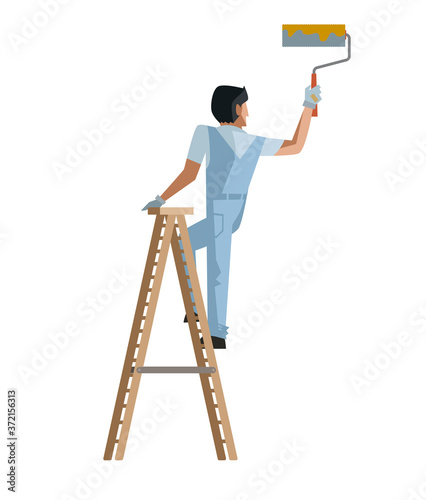 man worker painting with brush