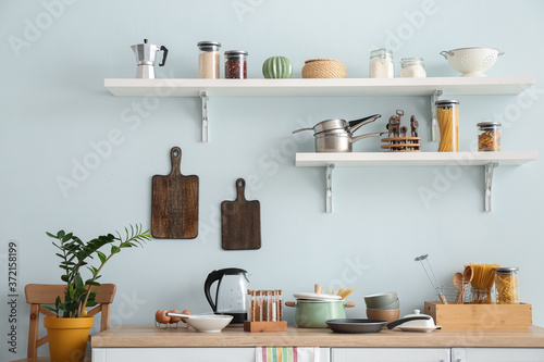 Set of utensils and products in kitchen