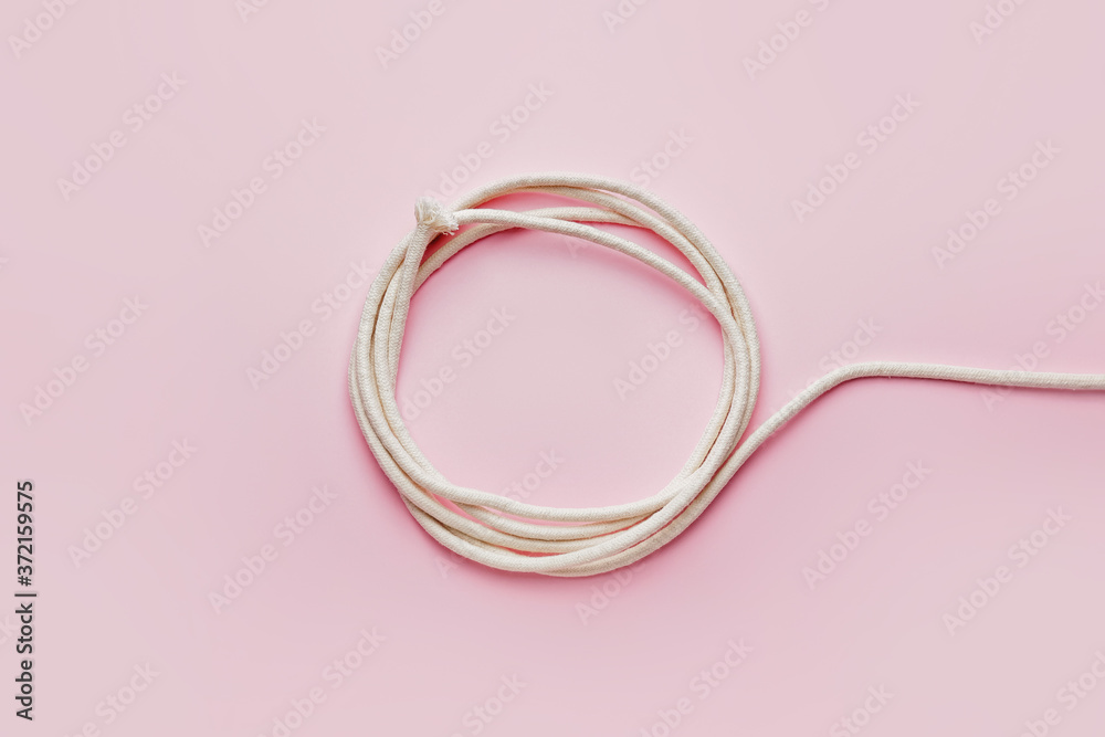 Long rope on color background Long rope on color background