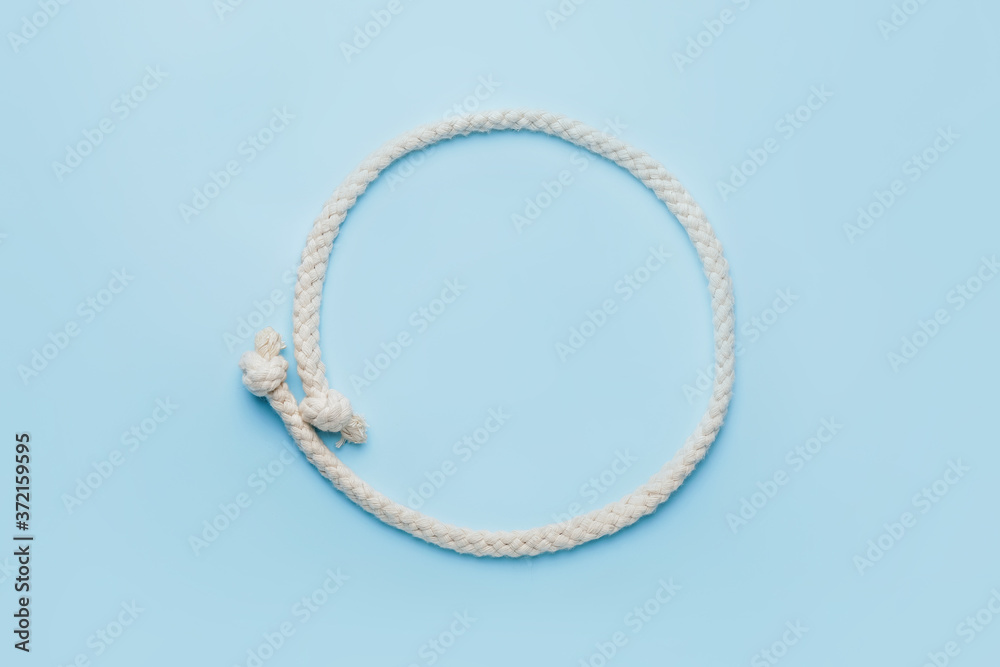 Long rope on color background Long rope on color background