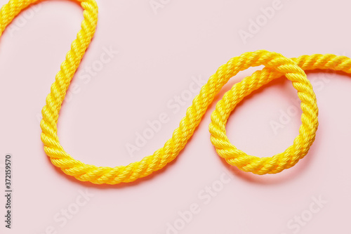 Bright yellow twisted rope ...