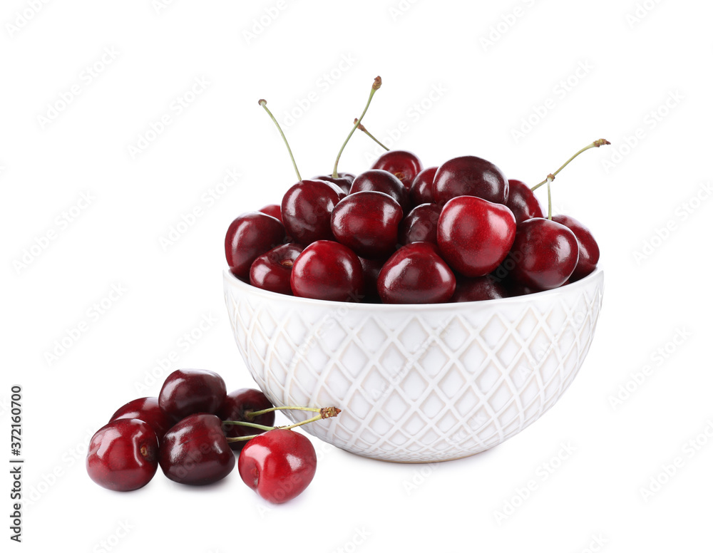 Tasty ripe red cherries and bowl isolated on white Tasty ripe red cherries and bowl isolated on white