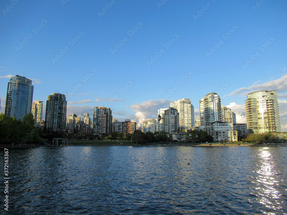 Sea and apartment buildings in Vancouver at summer.