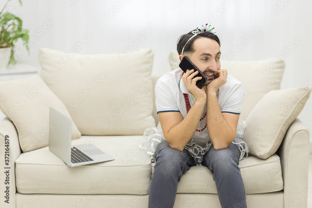 Photo of man talking over the phone with positive espression.