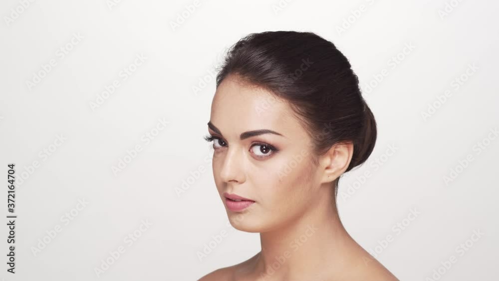 Studio portrait of young and beautiful brunette woman Studio portrait of young and beautiful brunette woman