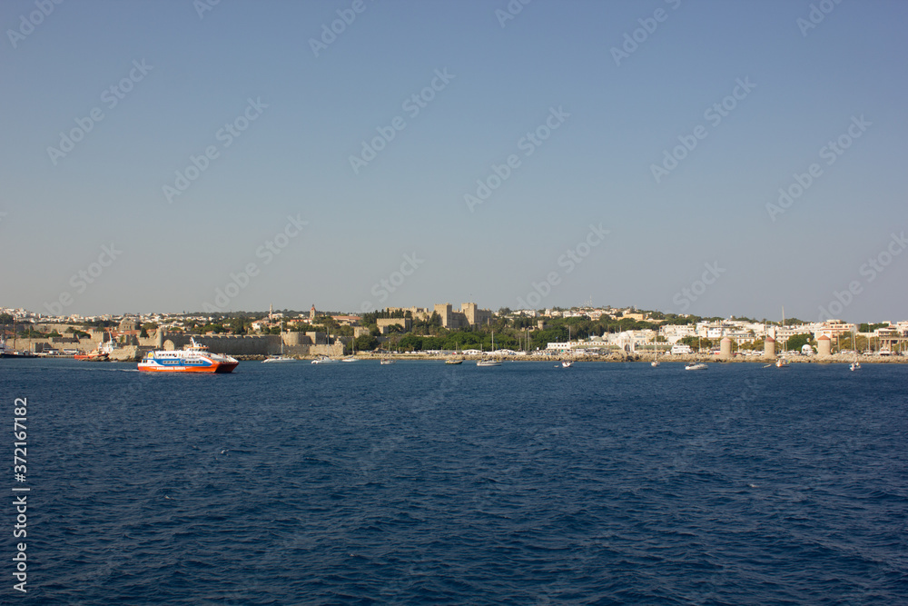 Greece. Rhodes island. Rest at the sea. Euro-trip. Sea water surface. Coast of Greece. Greece. Rhodes island. Rest at the sea. Euro-trip. Sea water surface. Coast of Greece.