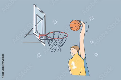 Sport, game, match, competition, hobby concept. Young professional man guy athlete basketball player participated in tourney match on court field jumping scoring athletic slam dunk. Active lifestyle.