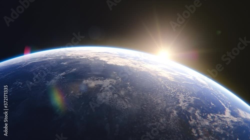 Breathtaking View of the Planet. Rising Sun Illuminates Our Blue Planet's Clouds, Oceans and Peaceful Cities. Scientifically Accurate 3D Graphical Animation photo