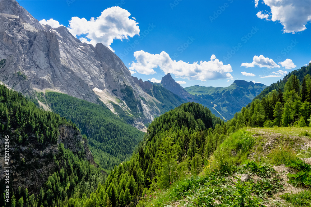 Alpine landscape in the Dolomites, Italy. Glacier Marmolada and Fedaia pass