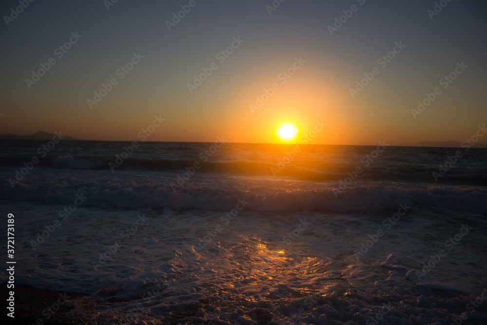 Obraz premium Greek beaches at sunset. Rhodes island. Summer vacation. Euro-trip.